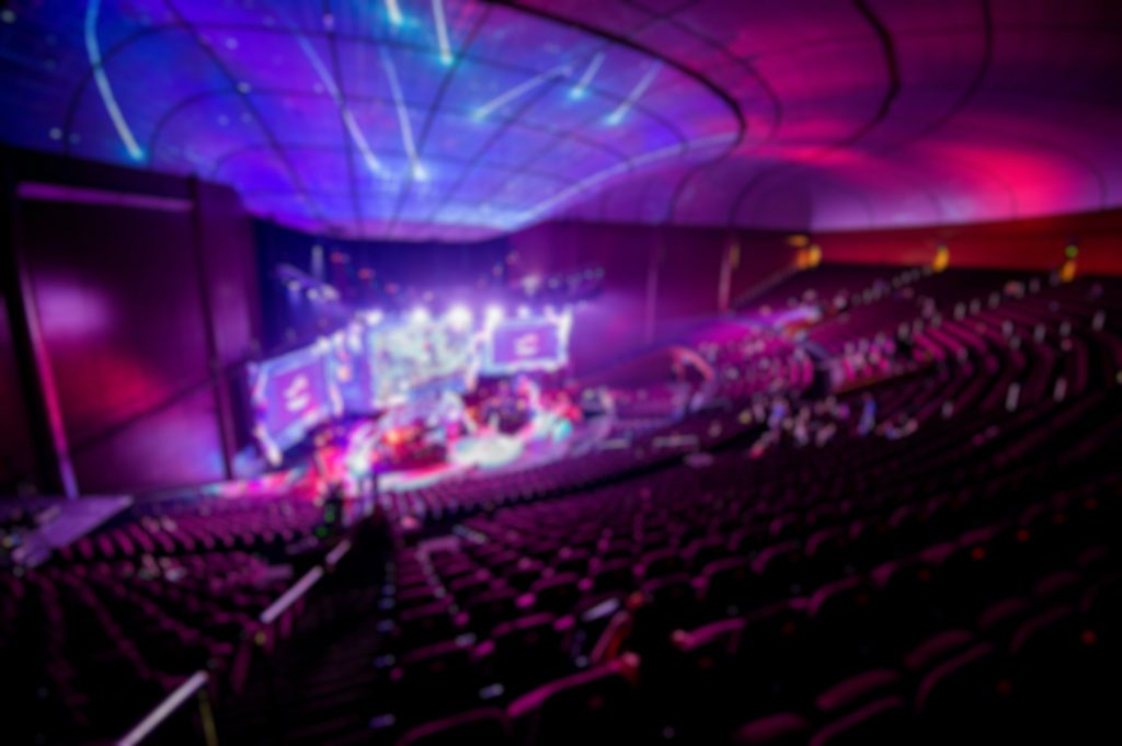 Abstract blurred background of big esports gaming event at big arena